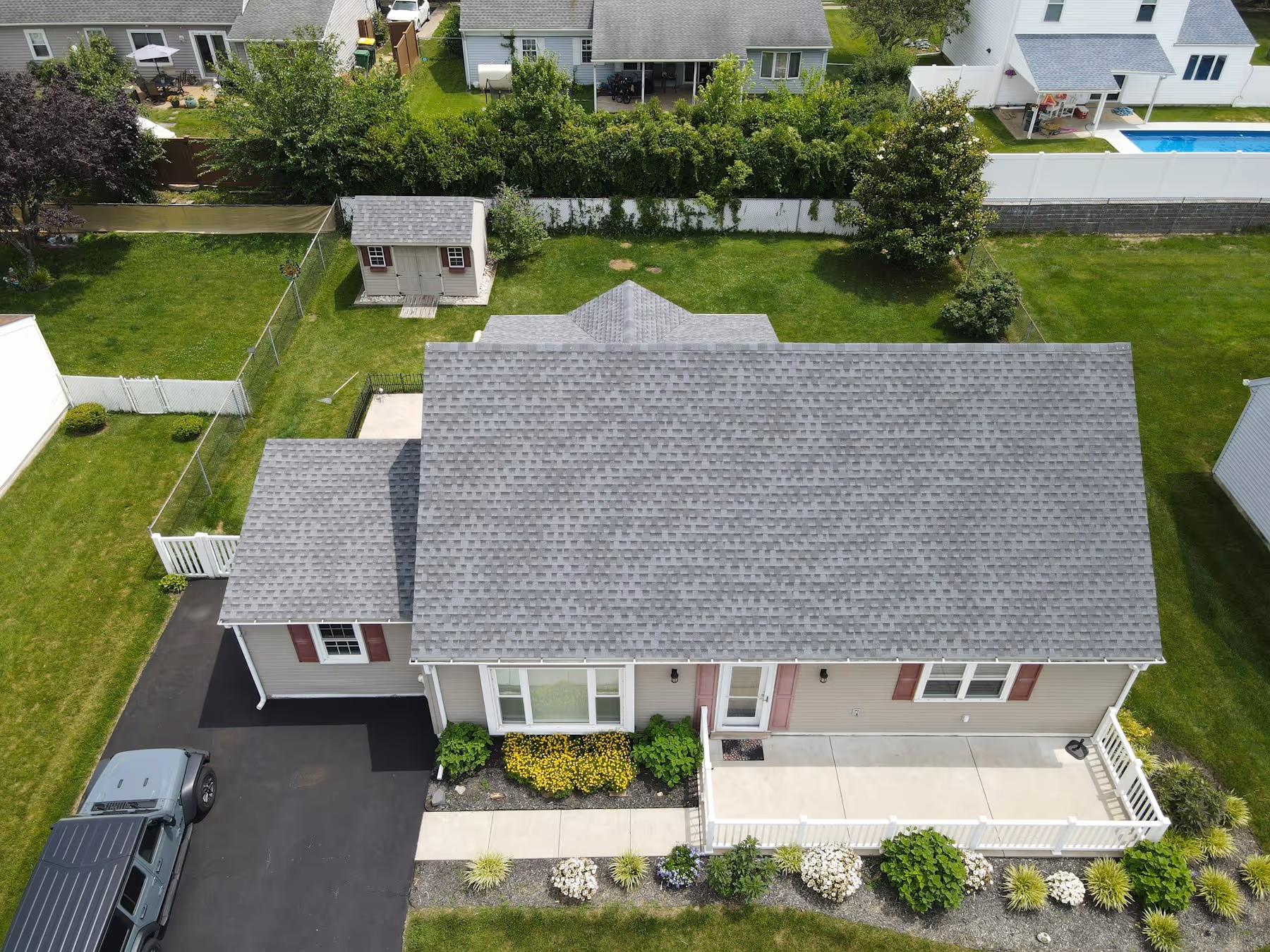 Aerial view of a Pennsylvania home with a gray shingle roof